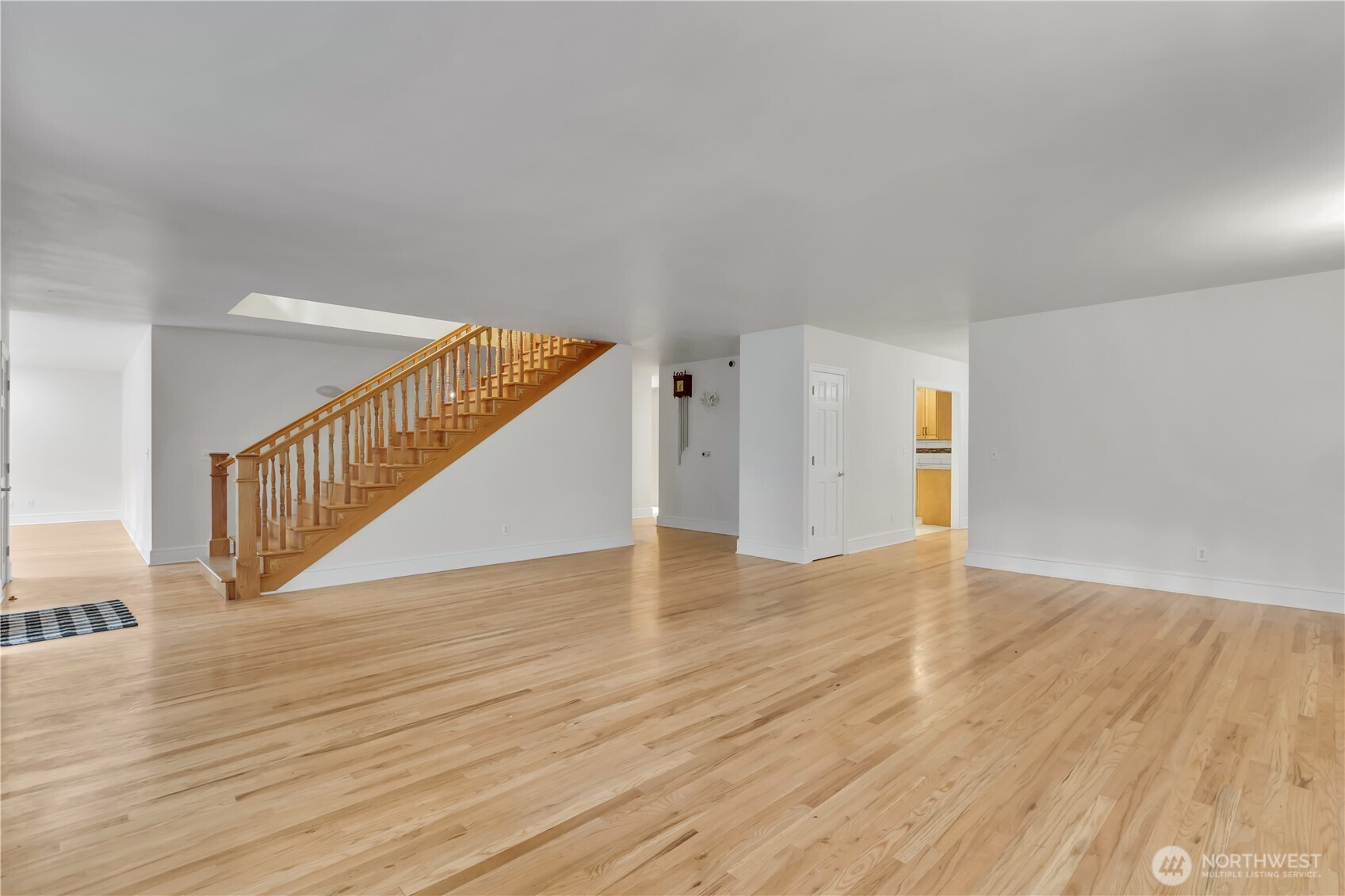 1622 Southwest 140th Street Burien, WA 98166 - Photo 33 of 38 a view of an empty room with wooden floor
