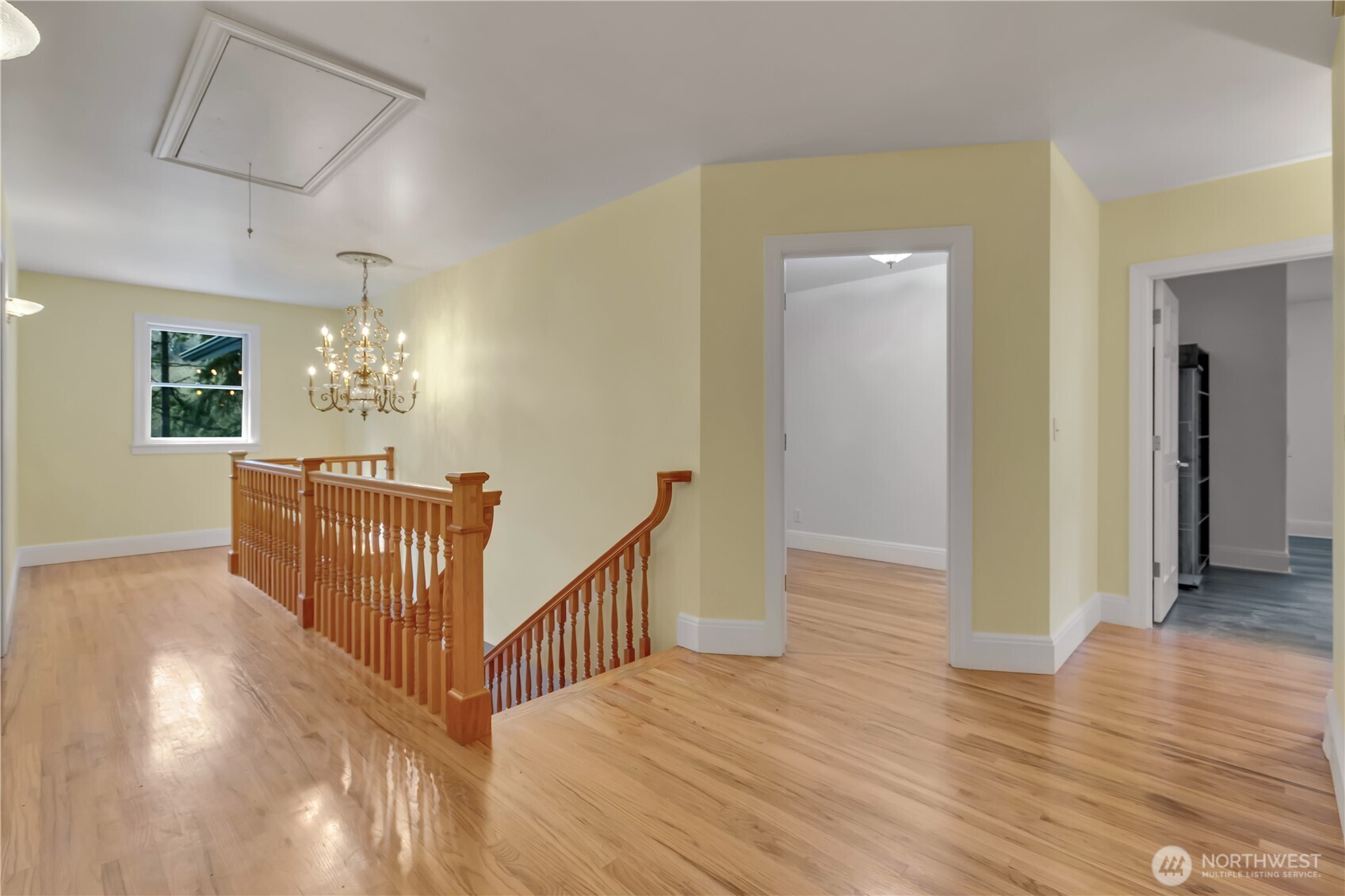 1622 Southwest 140th Street Burien, WA 98166 - Photo 34 of 38 a view of a hallway view with wooden floor and staircase