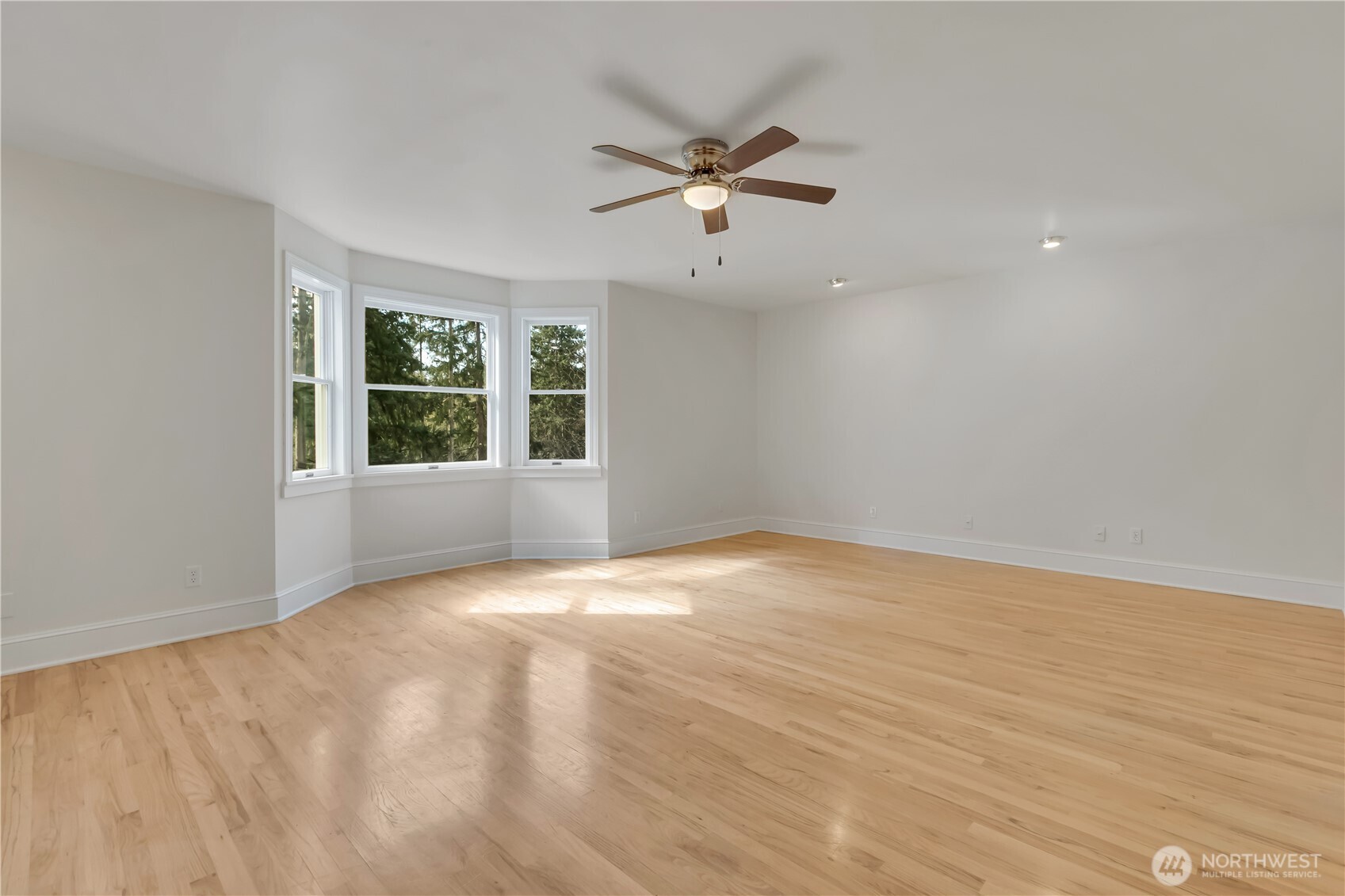 1622 Southwest 140th Street Burien, WA 98166 - Photo 35 of 38 an empty room with wooden floor fan and windows