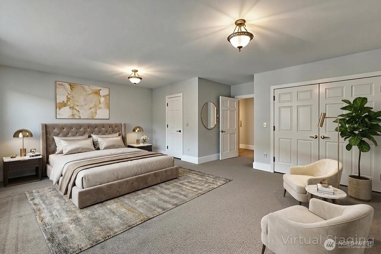 1622 Southwest 140th Street Burien, WA 98166 - Photo 9 of 38 a spacious bedroom with a bed and a chandelier