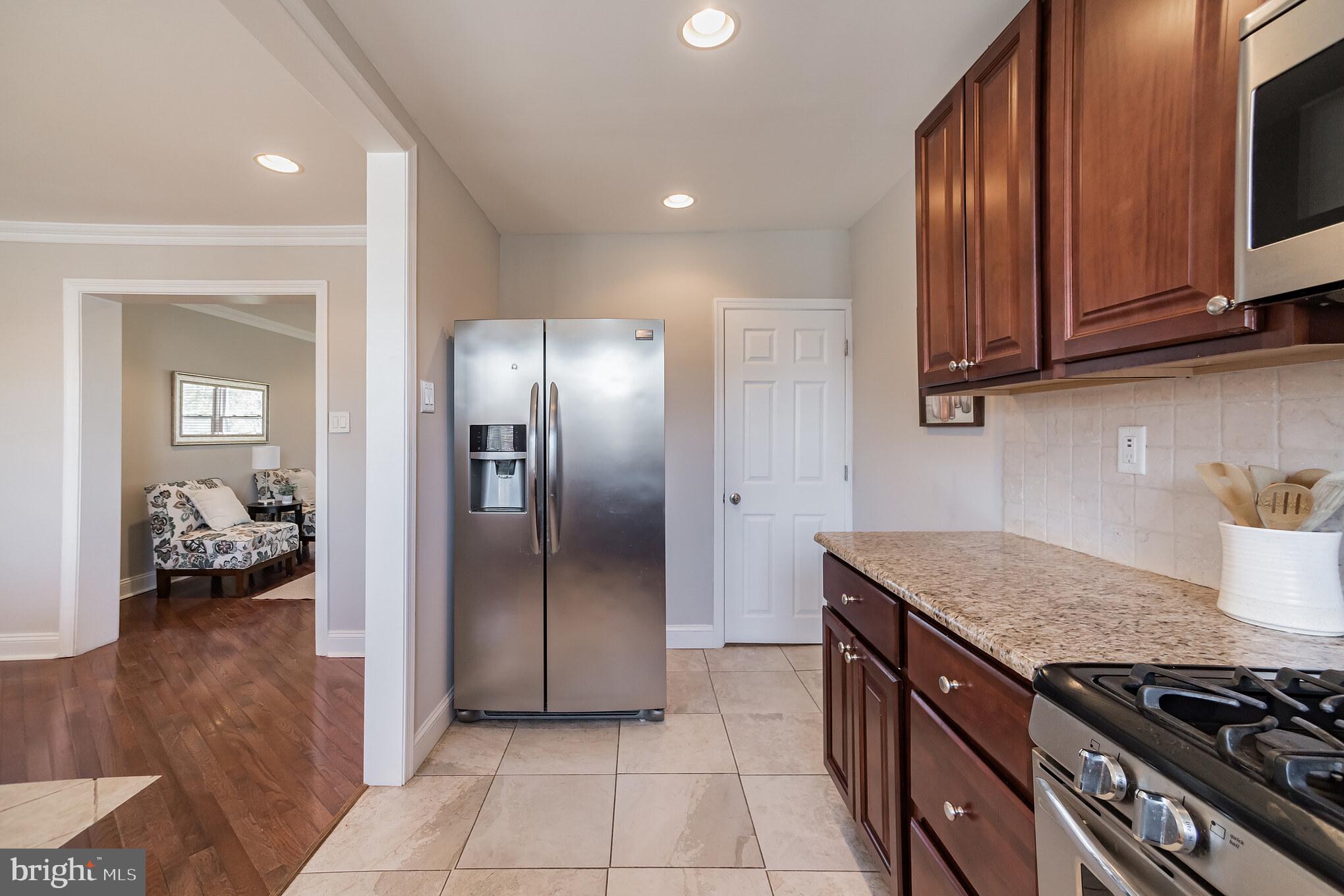 137 St Laurence Road Upper Darby, PA 19082 - Photo 12 of 30 Updated kitchen with stainless steel refrigerator
