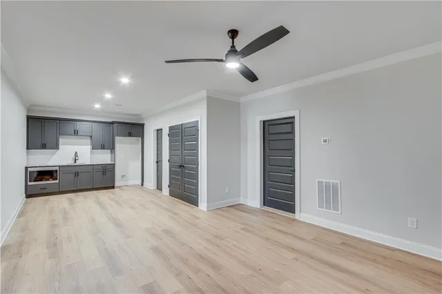 a view of a big house with many windows