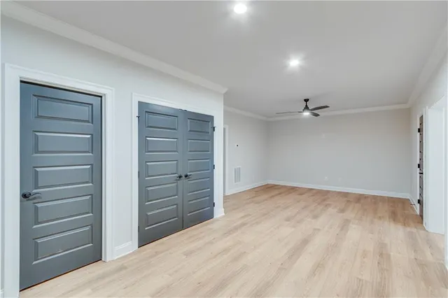a view of a swimming pool with a table and chairs
