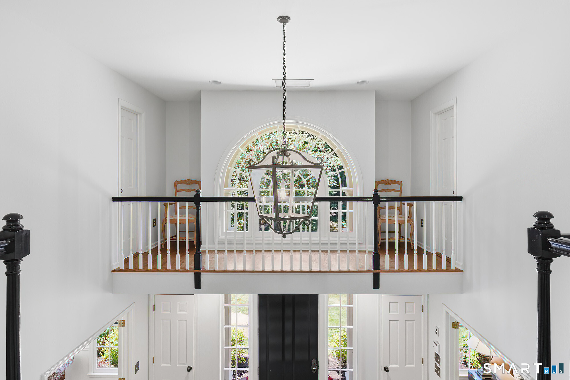 62 Blacksmith Ridge Road Ridgefield, CT 06877 - Photo 18 of 40 Veranda above the entrance with doors and passageway to two of the rooms