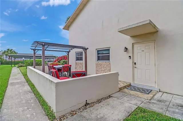 a view of a balcony with couch and a table