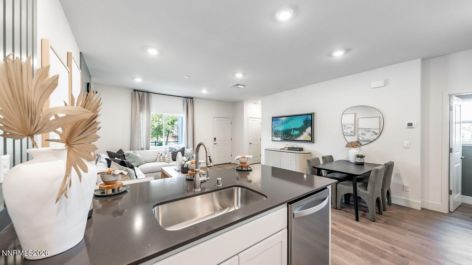 1596 Grazer Way Reno, NV 89523 - Photo 11 of 25 a kitchen with sink and view of living room