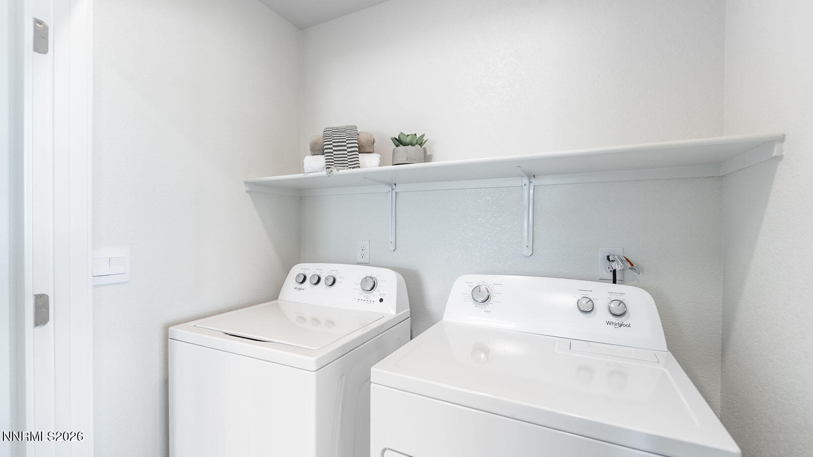 1596 Grazer Way Reno, NV 89523 - Photo 25 of 25 a utility room with dryer and washer