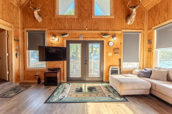 a living room with furniture and a table