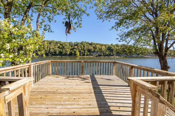 a view of a two chairs on the roof deck