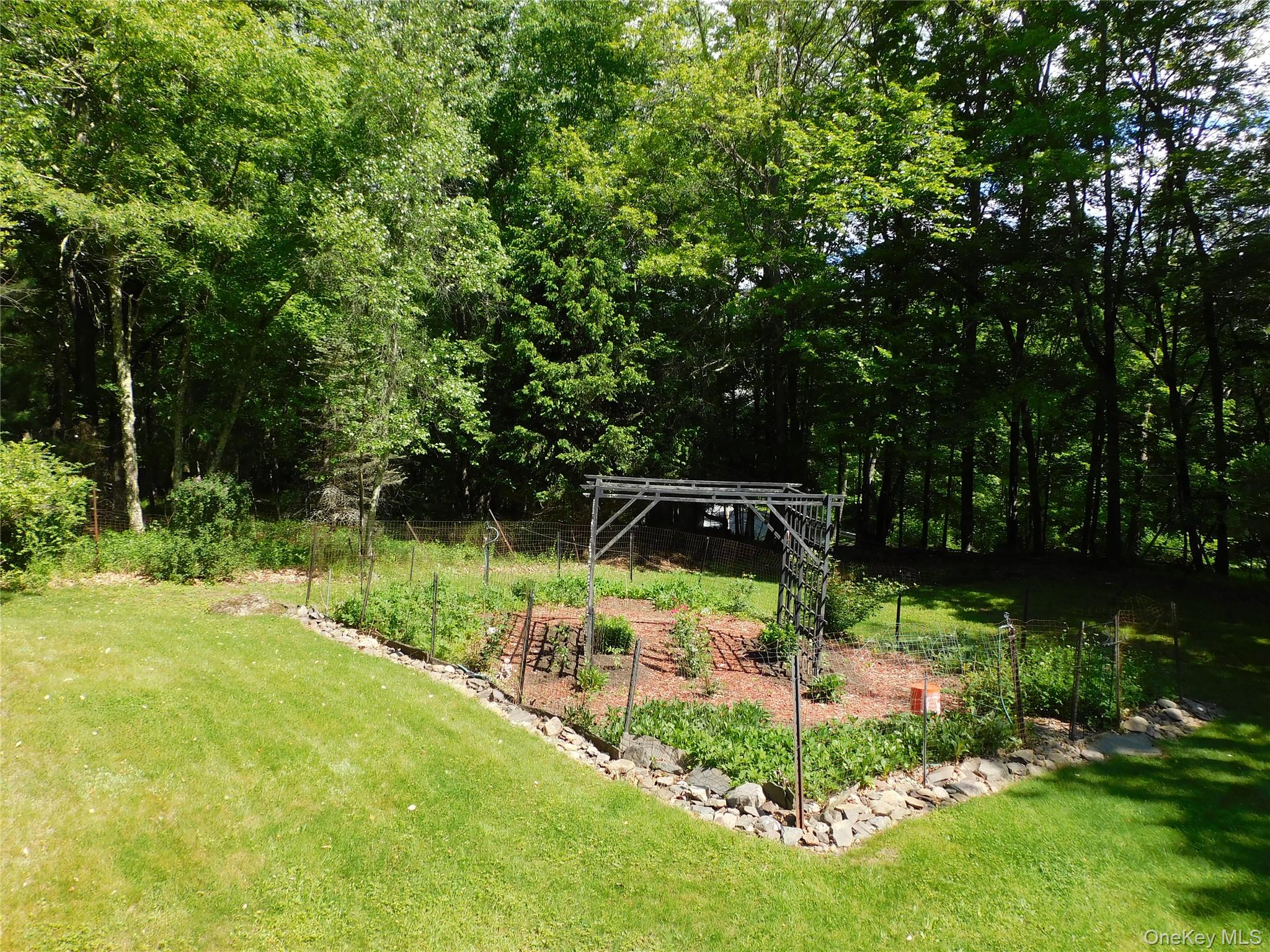 18-20 Church Road Mountain Dale, NY 12763 - Photo 7 of 20 a garden view with a lake view