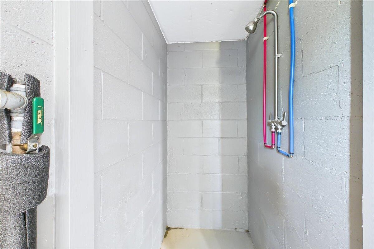 858 Main Street Decatur, TN 37322 - Photo 41 of 65 a bathroom with a granite countertop shower and a sink