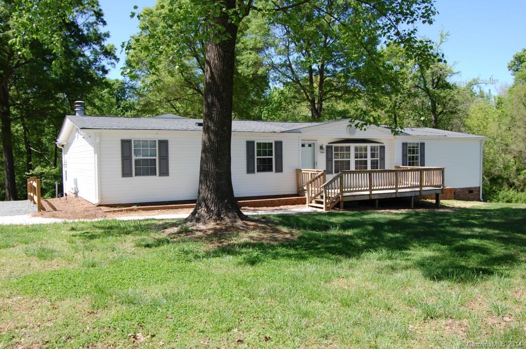 4015 Love Mill Road Monroe, NC 28110 - Photo 1 of 19 a house view with a garden space