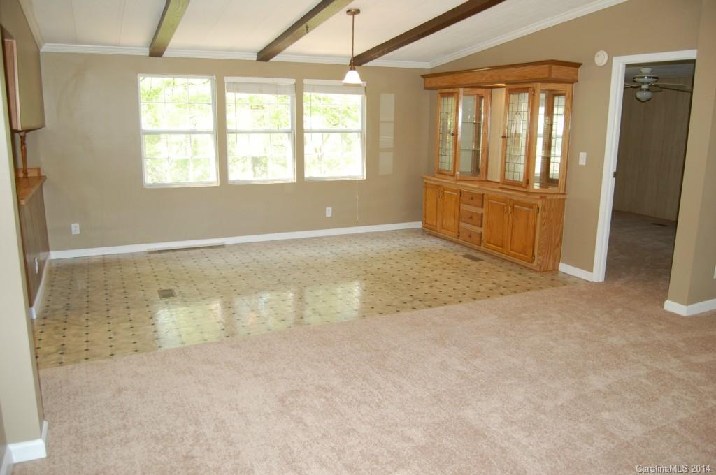 4015 Love Mill Road Monroe, NC 28110 - Photo 12 of 19 an empty room with windows