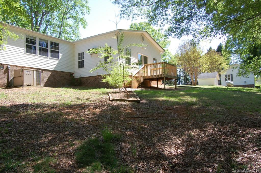 4015 Love Mill Road Monroe, NC 28110 - Photo 3 of 19 a front view of a house with a yard