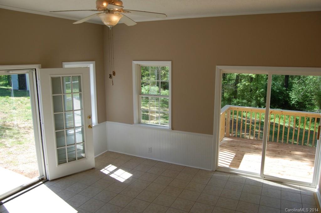 4015 Love Mill Road Monroe, NC 28110 - Photo 6 of 19 a view of an empty room with a balcony
