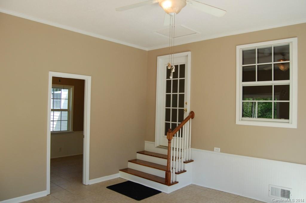 4015 Love Mill Road Monroe, NC 28110 - Photo 8 of 19 a view of an entryway with wooden floor and windows