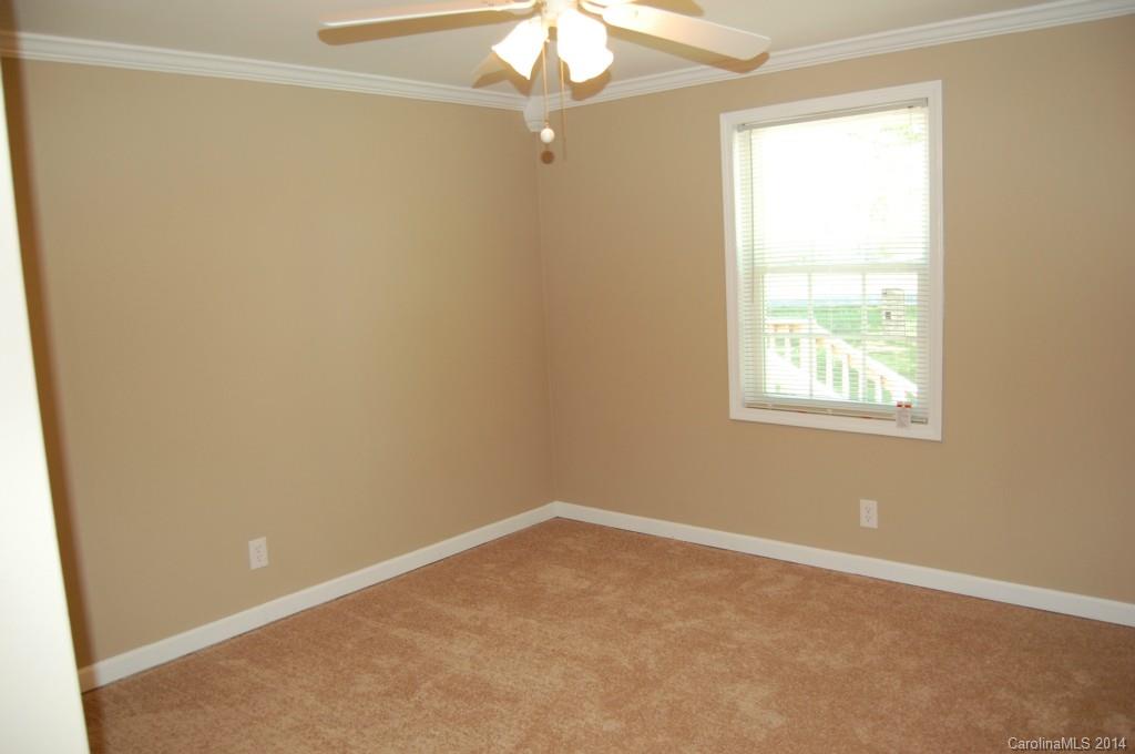 4015 Love Mill Road Monroe, NC 28110 - Photo 10 of 19 an empty room with a window