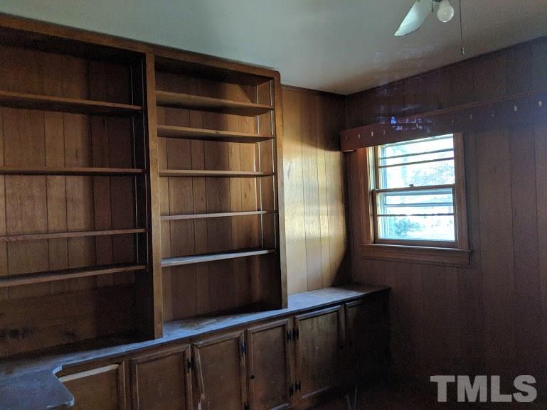 142 Evergreen Road Clarksville, VA 23927 - Photo 11 of 25 a view of walk in closet with empty racks