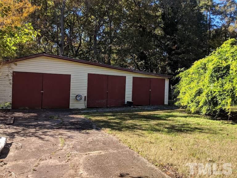 142 Evergreen Road Clarksville, VA 23927 - Photo 3 of 25 a house with trees in front of it