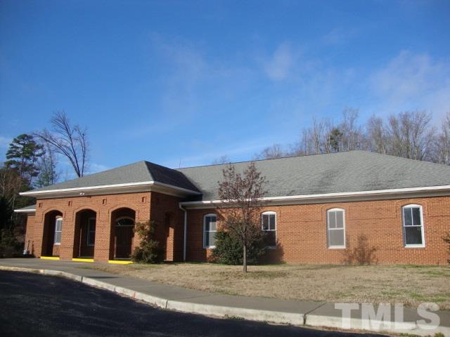 142 Evergreen Road Clarksville, VA 23927 - Photo 24 of 25 a front view of a house with a garage