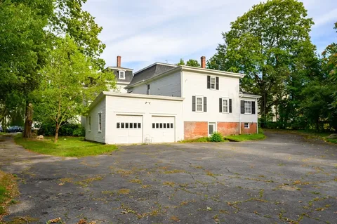 a sign on the side of a road