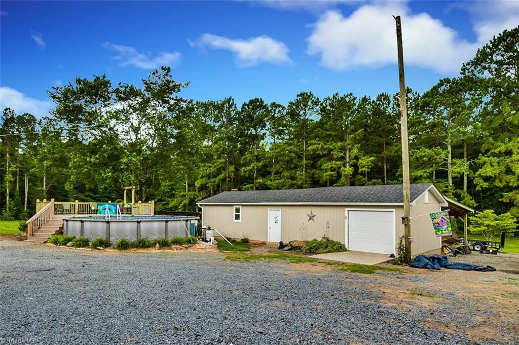 1204 Bescher Chapel Road Trinity, NC 27370 - Photo 19 of 27 50 x 17 building with garage door, and shed on back