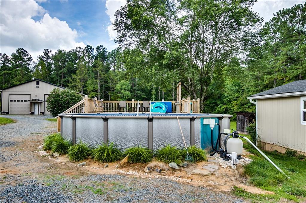 1204 Bescher Chapel Road Trinity, NC 27370 - Photo 20 of 27 Above ground pool with deck