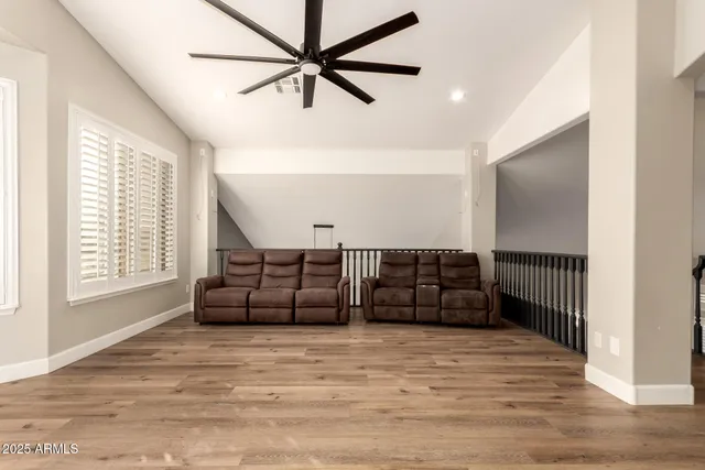 a view of a big house with a yard