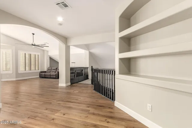a bathroom with a mirror and a sink