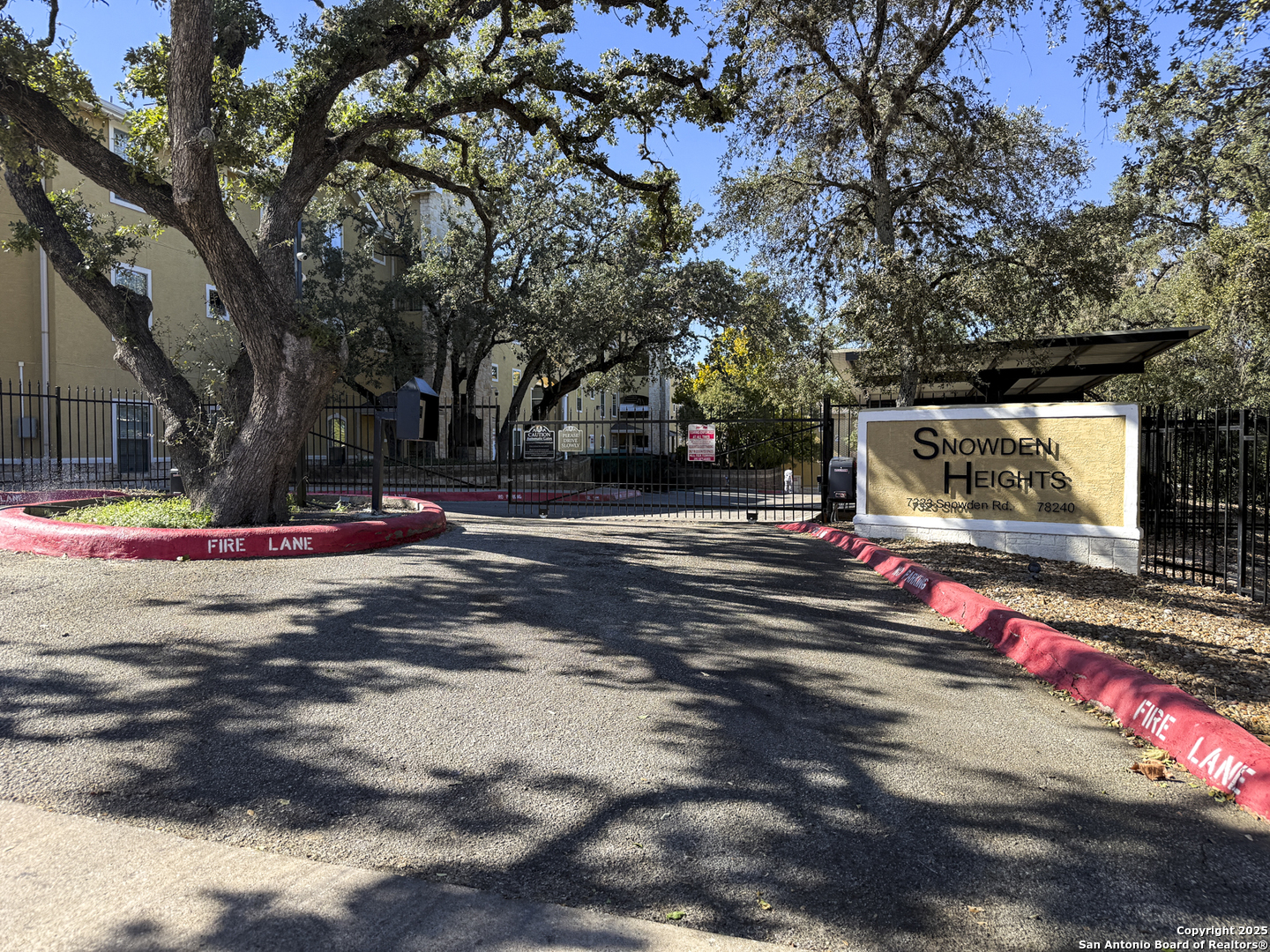 7323 Snowden Road, Unit 1102 San Antonio, TX 78229 - Photo 27 of 27 a view of street with large trees