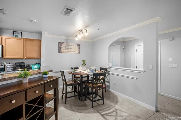 a view of a dining room with furniture