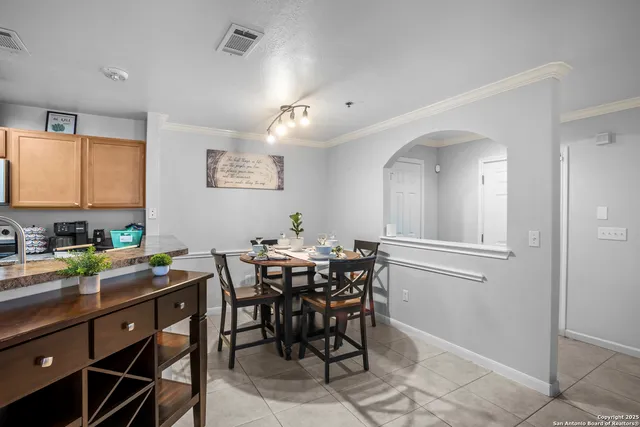 a view of a dining room with furniture