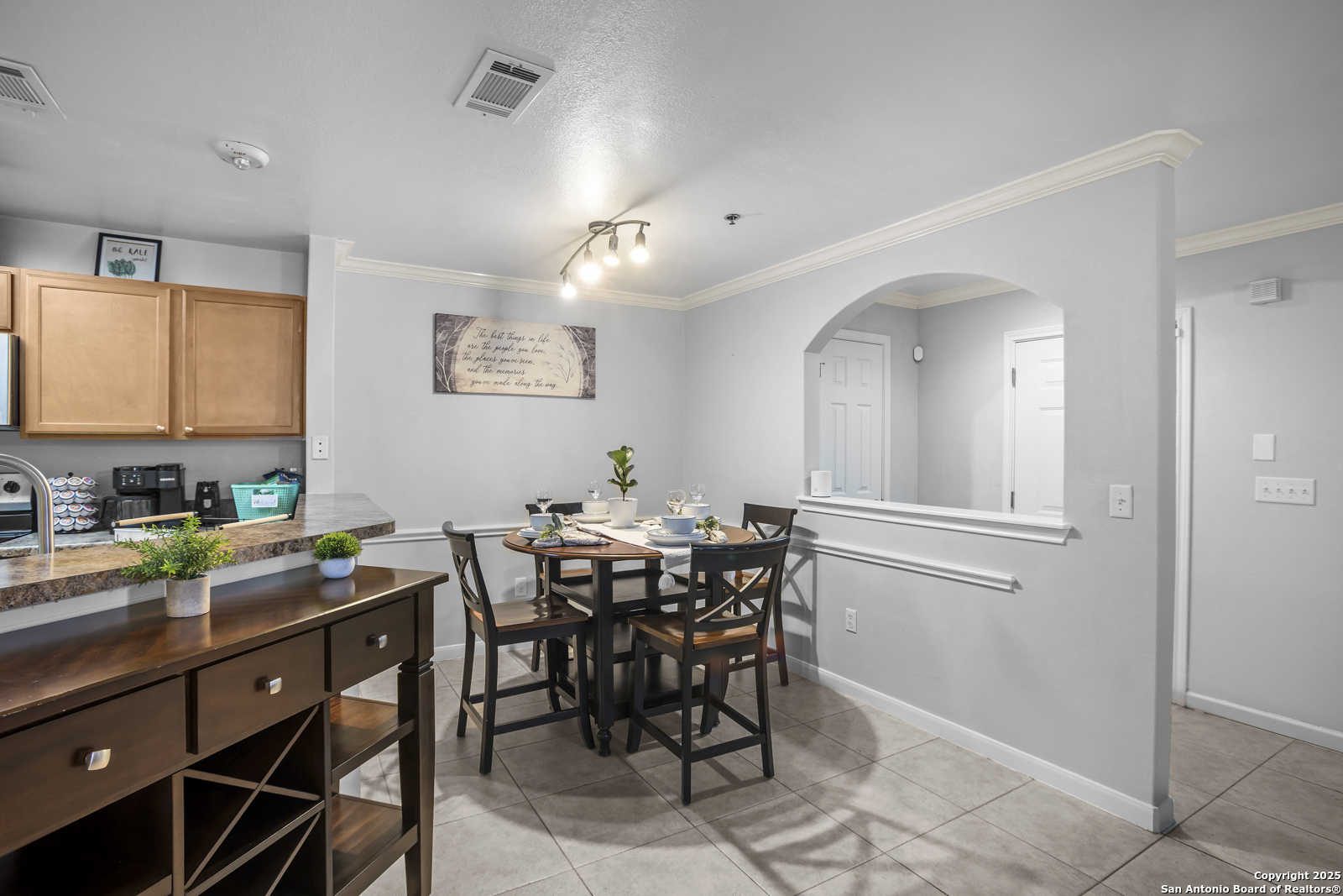 7323 Snowden Road, Unit 1102 San Antonio, TX 78229 - Photo 9 of 27 a view of a dining room with furniture