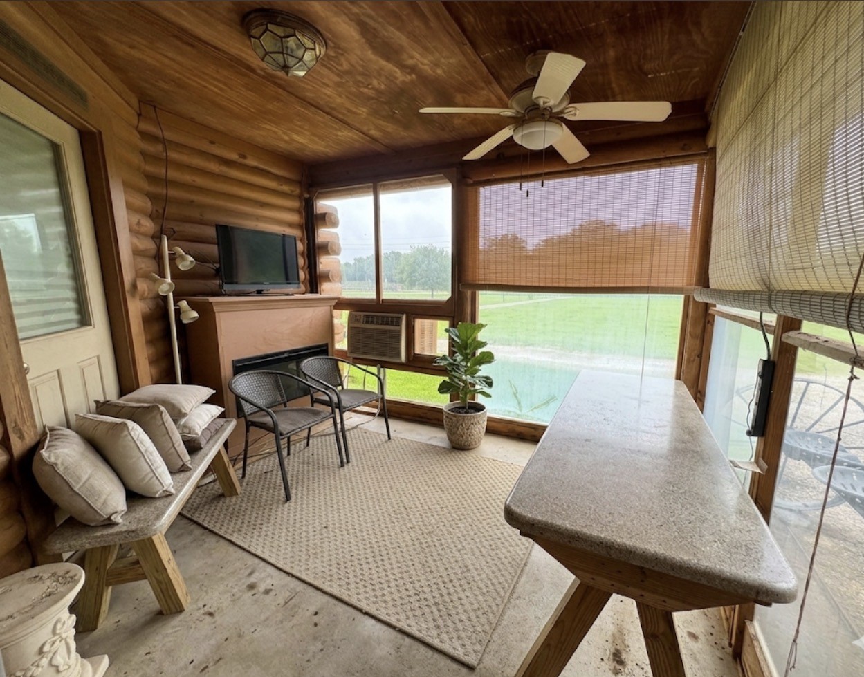33315 Fulshear Farms Road Fulshear, TX 77441 - Photo 18 of 19 a living room with furniture and a large window