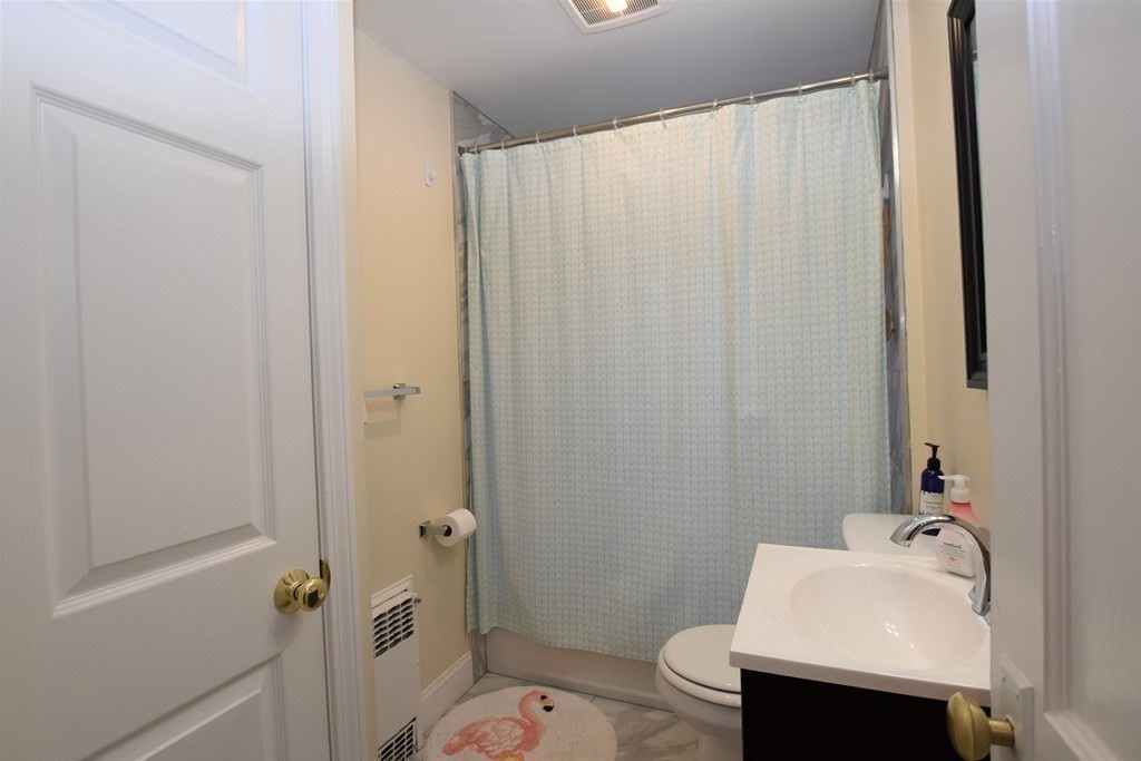 25 Sawin Street, Unit 25 Watertown, MA 02472 - Photo 13 of 22 a bathroom with a sink and toilet