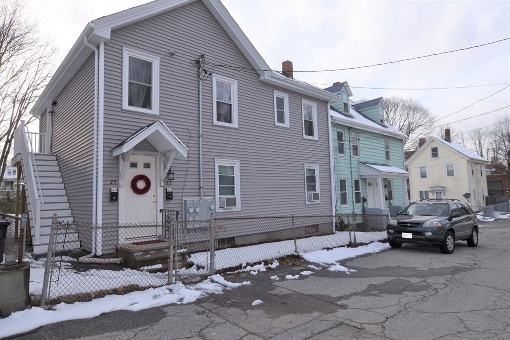 25 Sawin Street, Unit 25 Watertown, MA 02472 - Photo 22 of 22 a view of a street with cars