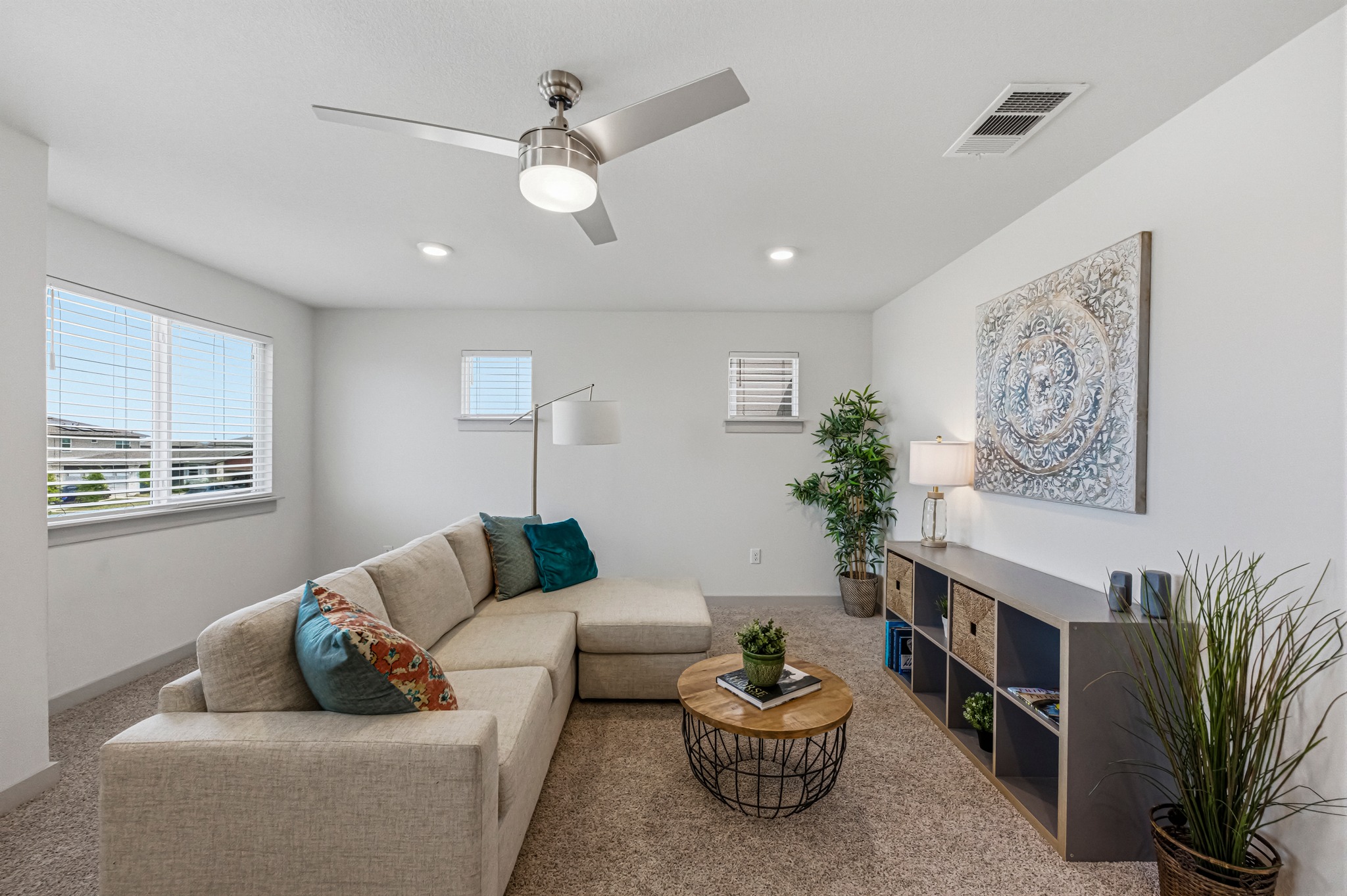 7511 Traylor Cove Austin, TX 78724 - Photo 19 of 40 a living room with furniture and a potted plant