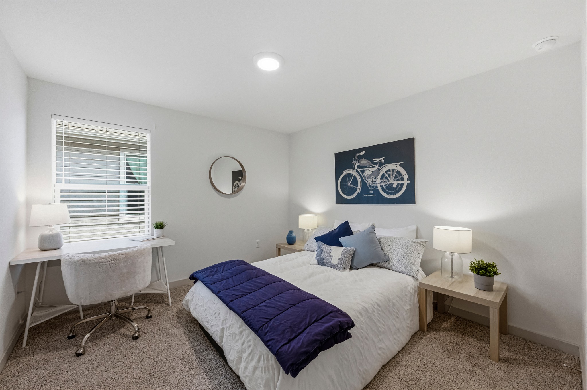 7511 Traylor Cove Austin, TX 78724 - Photo 22 of 40 a bedroom with a bed a table and chair