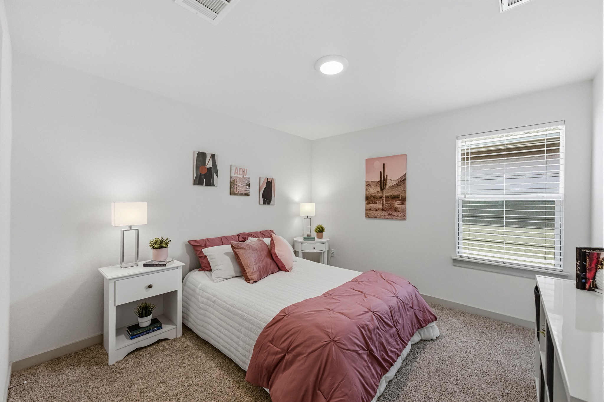 7511 Traylor Cove Austin, TX 78724 - Photo 24 of 40 a bedroom with a bed and a window