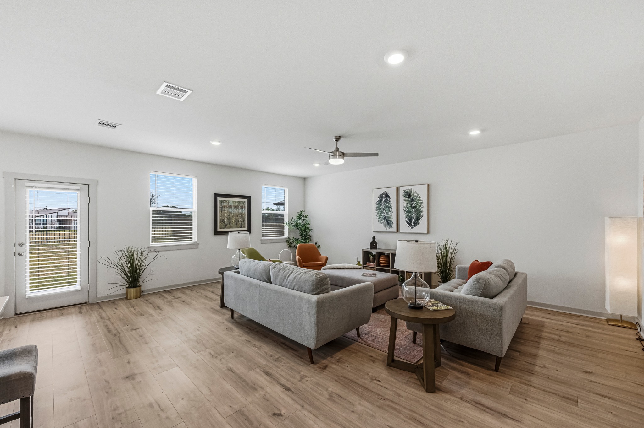 7511 Traylor Cove Austin, TX 78724 - Photo 4 of 40 a living room with furniture and wooden floor