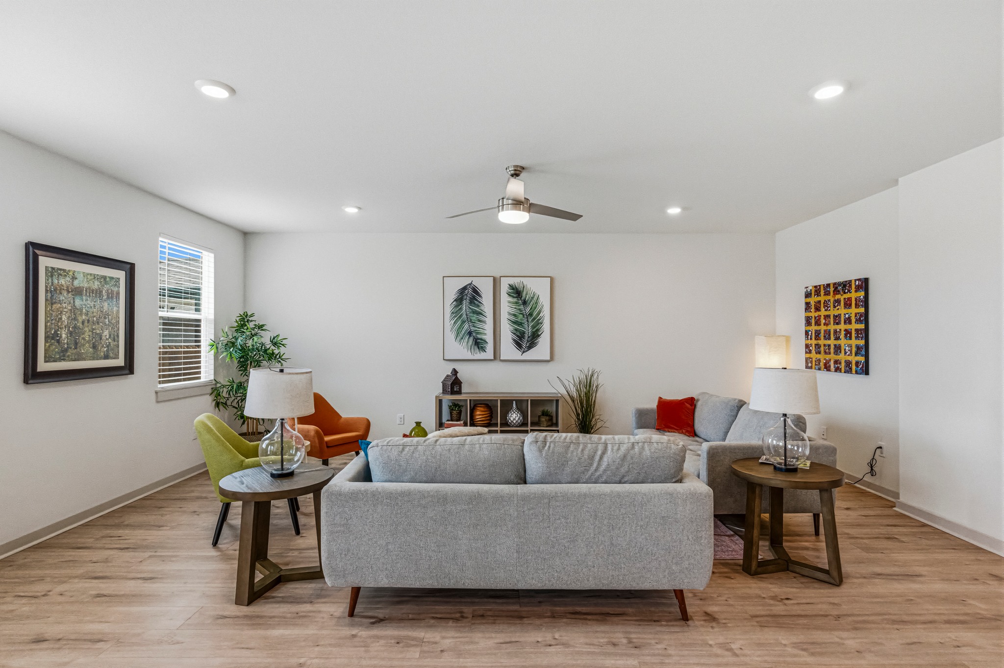 7511 Traylor Cove Austin, TX 78724 - Photo 5 of 40 a living room with furniture and a potted plant