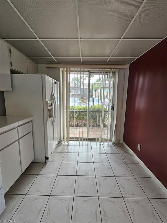 4140 Looking Glass Lane, Unit 5 Naples, FL 34112 - Photo 11 of 24 a view of a kitchen with a sink