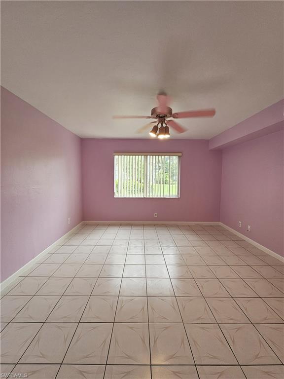 4140 Looking Glass Lane, Unit 5 Naples, FL 34112 - Photo 19 of 24 a view of an empty room and window