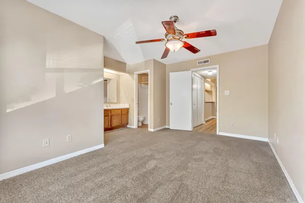 a view of a livingroom with a ceiling fan