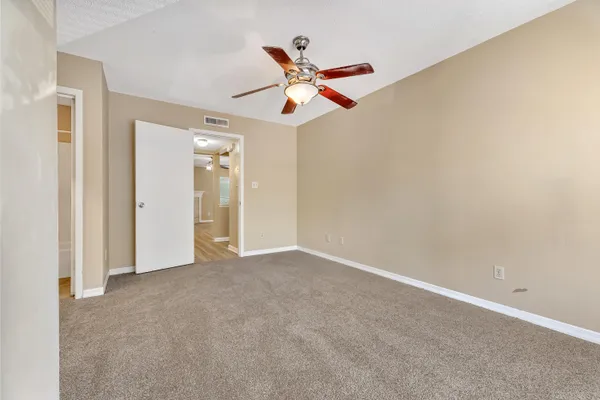 a view of a livingroom with a ceiling fan