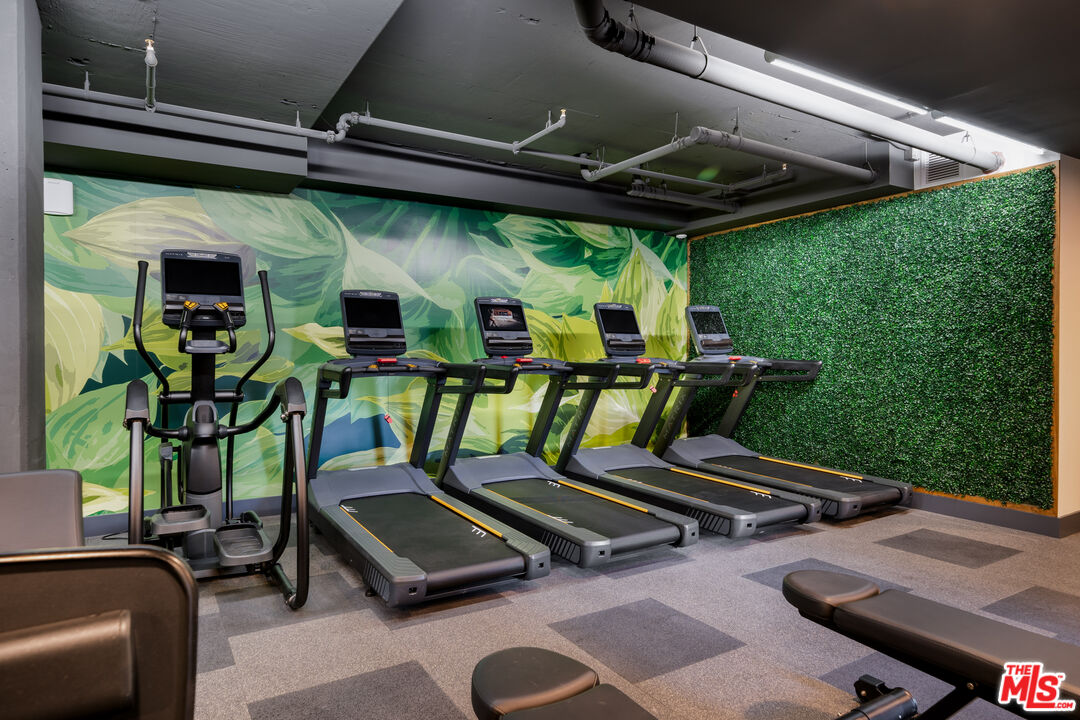 800 Western Avenue, Unit 822 Los Angeles, CA 90005 - Photo 11 of 26 a living room with furniture