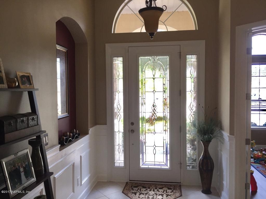 6028 White Tip Road Jacksonville, FL 32258 - Photo 4 of 32 04-Custom Glass Door Entry