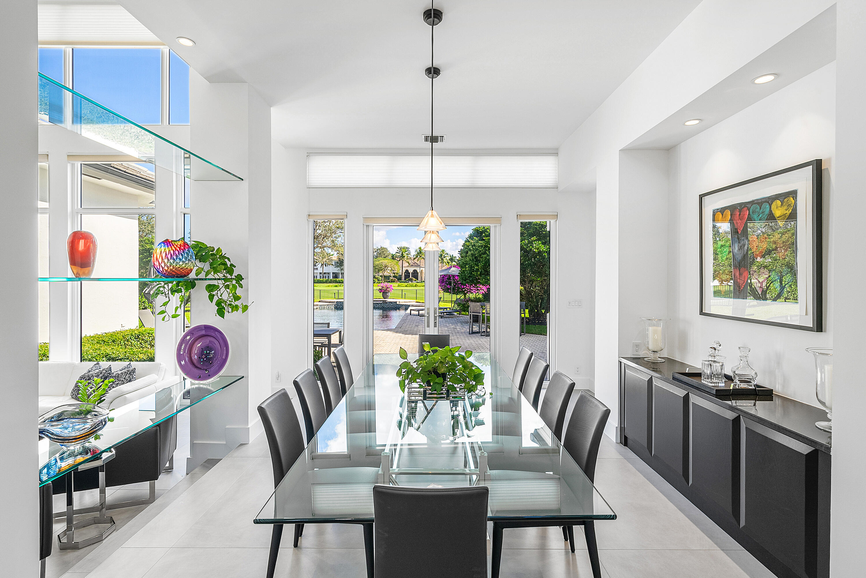 3710 Northwest 53rd Street Boca Raton, FL 33496 - Photo 20 of 42 a view of a dining room with furniture window and wooden floor