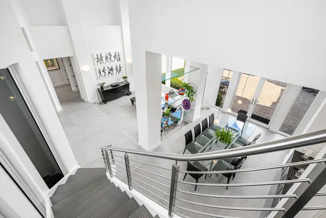 a view of living room with furniture and flat screen tv