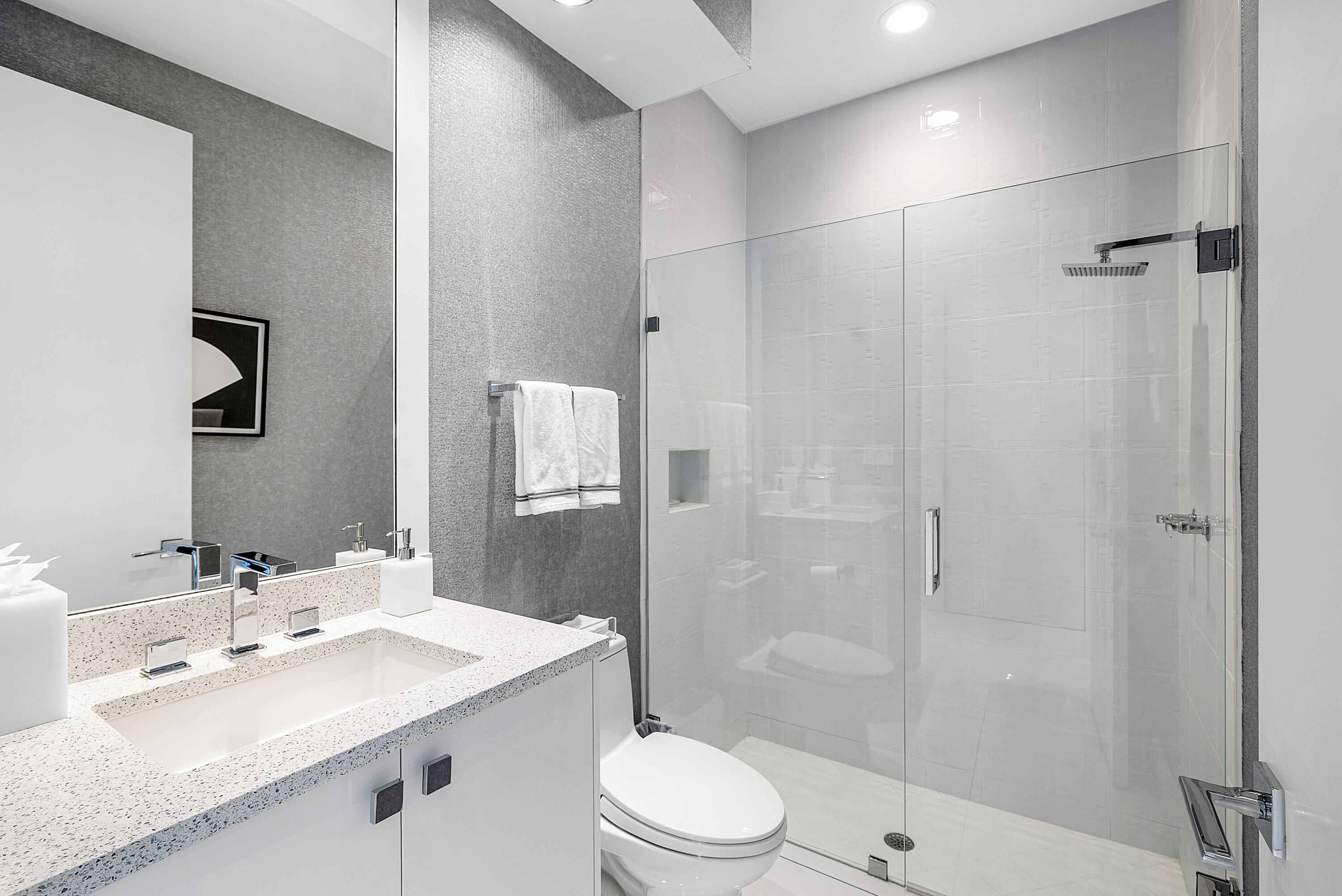 3710 Northwest 53rd Street Boca Raton, FL 33496 - Photo 32 of 42 a bathroom with a sink toilet and shower